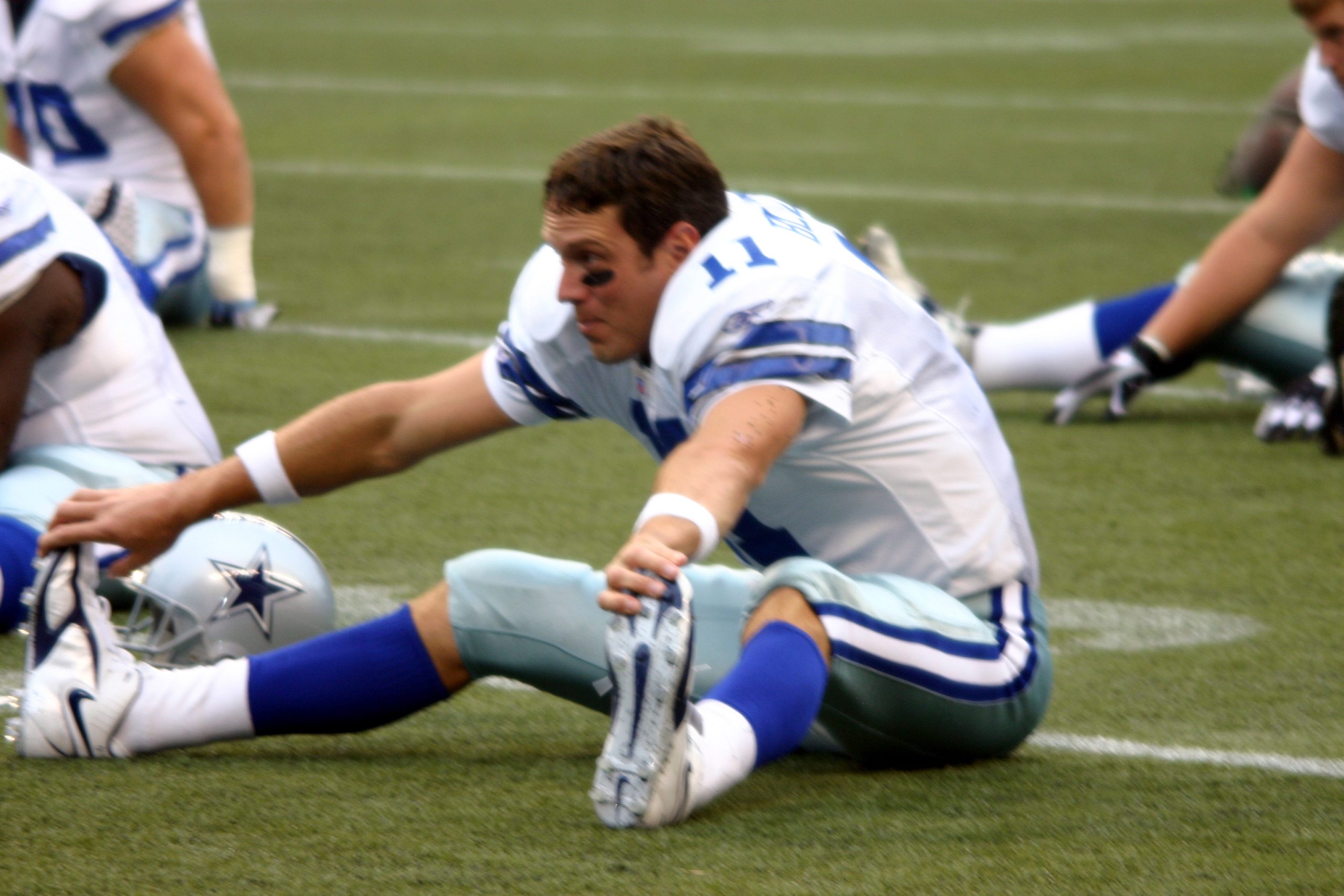 football player stretching