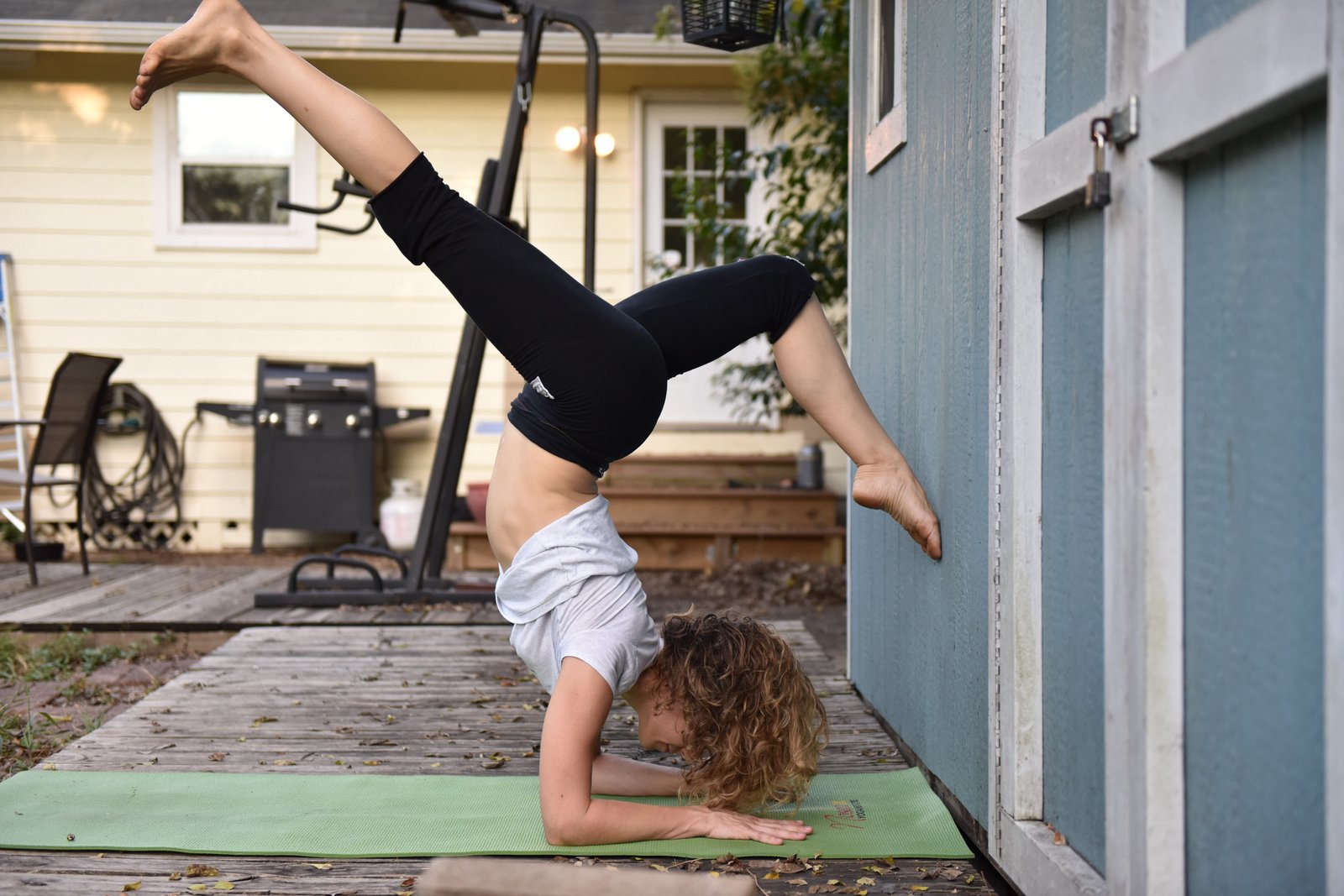 Learn to do Scorpion from Forearms with a Yoga Block and the Wall - YouTube